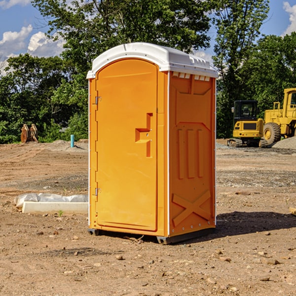 how often are the porta potties cleaned and serviced during a rental period in Bandana